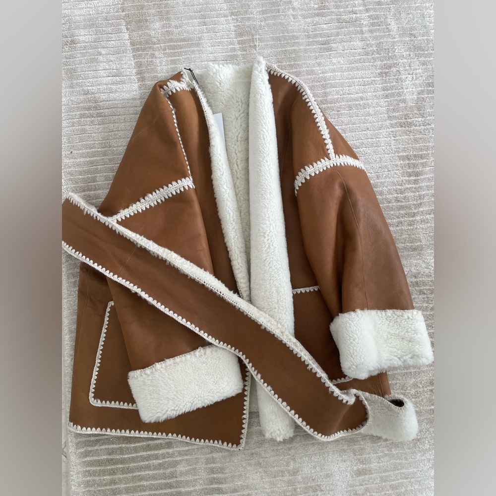 Brown Leather Jacket with White Accents